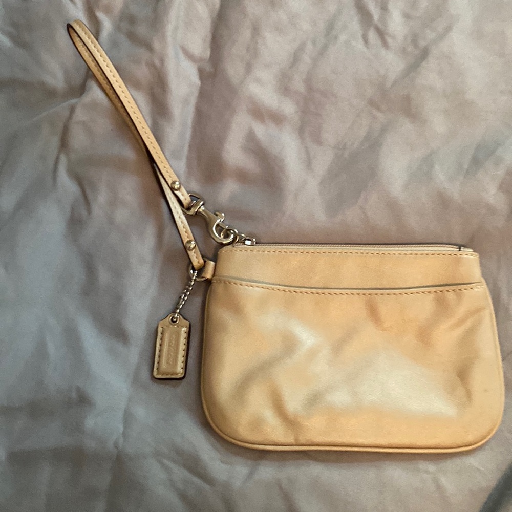 Tan leather Coach wristlet